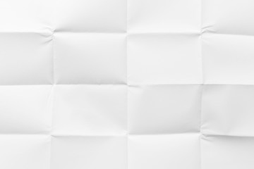Blank paper folded in sixteen, close-up