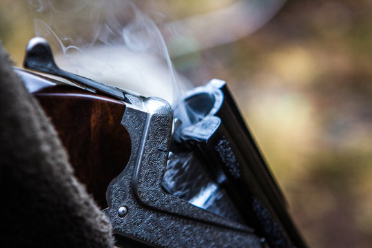 Smoking hunting gun or shotgun, clay pigeon shooting, Aviemore, Scotland, UK