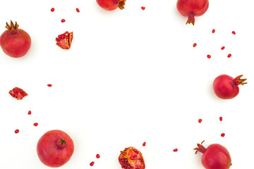 Pomegranate with seeds isolated on white background. Food frame background. Flat lay