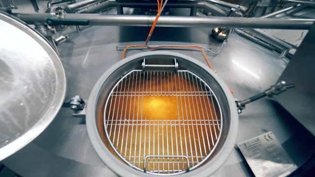 Big machine mixes dairy in a facility.