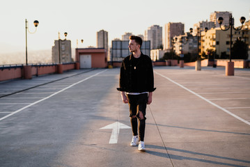 Young man walking on the roof