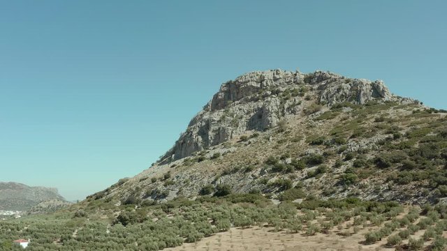 Aerial backwards dolly, Mijas mountain in Marbella, hiking climbing and activities concept.