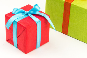 Gift boxes with ribbons and christmas decor isolated on white background. Happy birthday colorful gifts