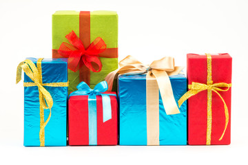 Gift boxes with ribbons and christmas decor isolated on white background. Happy birthday colorful gifts