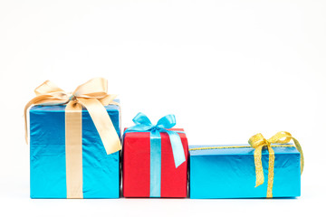 Gift boxes with ribbons and christmas decor isolated on white background. Happy birthday colorful gifts