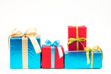 Gift boxes with ribbons and christmas decor isolated on white background. Happy birthday colorful gifts