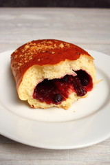 Blueberry Bun. Bun made from yeast dough, filled with bilberries, delicately covered with crumble.