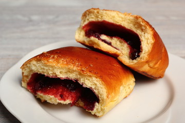 Blueberry Bun. Bun made from yeast dough, filled with bilberries, delicately covered with crumble.