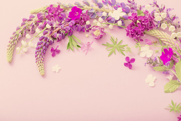 purple, blue, pink flowers on paper background