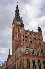 Fototapeta na wymiar The renaissance town hall with clock tower of the Main City in Gdansk in Poland..