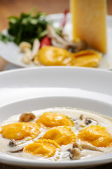 Italian Ravioli With Parmesan Cheese Close-Up On A Plate.