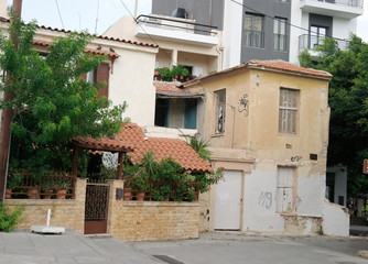 Old and modern buildings on the streets of Heraklion, Crete, Greece.