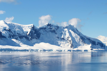 Mountains and icebergs between the islands around the Antarctic Peninsula, Palmer Archipelago, Antarctica