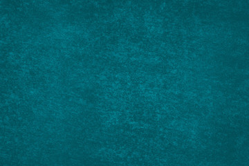 Fondo azul de una pared con manchas.