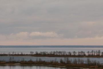 Panorama of  wide river on winter day