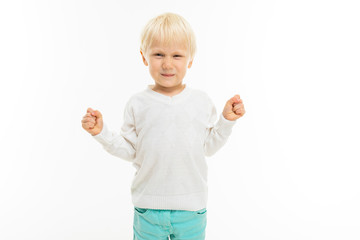 Little boy with short blonde hair and blue eyes, picture isolated on white background