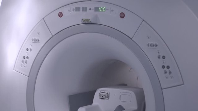 Hospital room with tomograph. An empty MRI, CT, PET scanner.