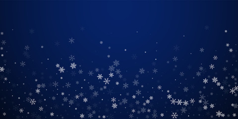Sparse snowfall Christmas background. Subtle flyin