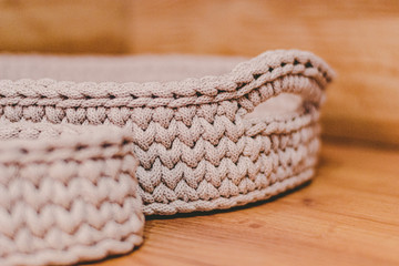 Fototapeta premium Beige crochet baskets for home