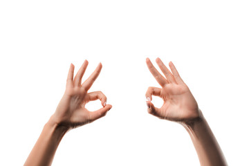 cropped view of woman showing ok sign with hands isolated on white