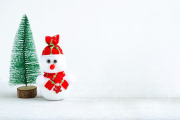 Christmas background, snowman and christmas tree on white background.