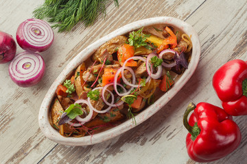 Georgian dish on the table photo for the menu of Eastern Caucasian cuisine. Grilled vegetables.