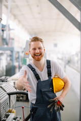 Factory worker handshaking