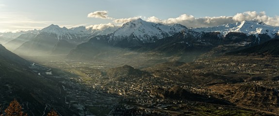 Sunset over the Sion valley, Autumn in Canton of Valais, Switzerland - obrazy, fototapety, plakaty