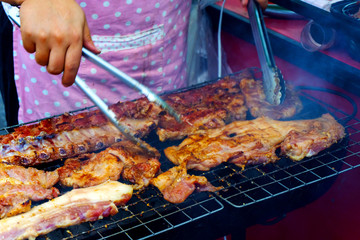 Roast pork that is cooked on the stove has a sweet and delicious flavor, eaten with sticky rice, is a popular snack in Thailand