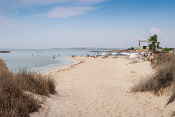 Relax on the beach near the sea with clear water on a Sunny day