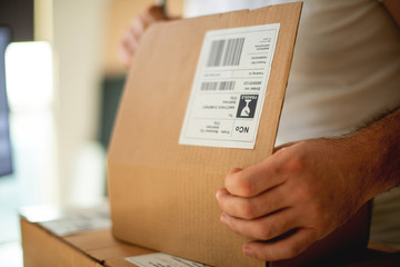 Naklejka premium Young Man Working in Delivery service