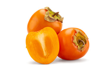 fresh ripe persimmons with leaf isolated on white background. full depth of field