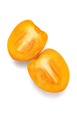 fresh ripe persimmons with leaf isolated on white background. full depth of field