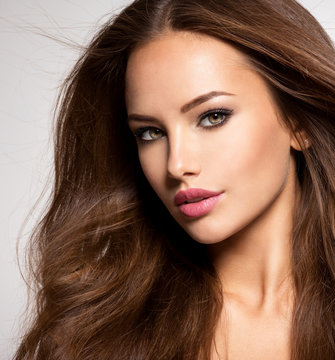 Beautiful woman with long brown hair