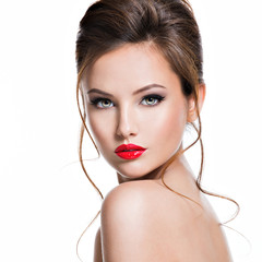 face of beautiful woman with bright red lipstick on the lips