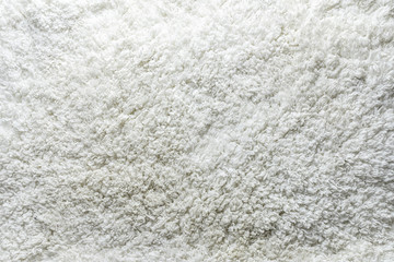 White fluffy wool background top view