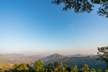 beautiful blue sky high peak mountains mist fog wildlife green forest at Khao Koh Phu Tub Berk Phetchabun Thailand guiding idea long weekend for backpacker camping campfire relaxing hiking  