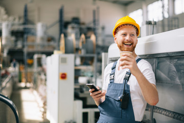 Factory worker on coffee break