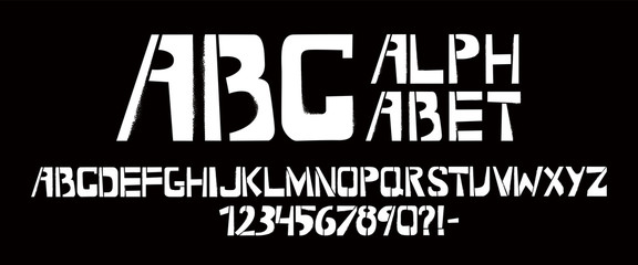 Obraz premium Stencil typeface with spray texture. Painted vector uppercase characters on black background. Typography alphabet for your designs: logo, typeface, card