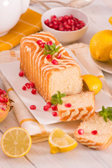 Lemon sponge cake with pomegranate.
