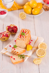 Lemon sponge cake with pomegranate.