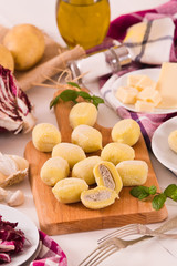 Potato gnocchi stuffed with radicchio and ricotta.