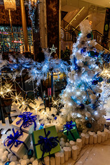 Christmas tree, gift boxes, lanterns and Christmas balls in Christmas 