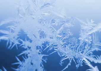 Color of the year 2020 classic blue. Macro of ice on frozen window close up