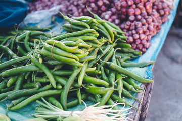 vegetables and potatoes are on sale in the fresh market
