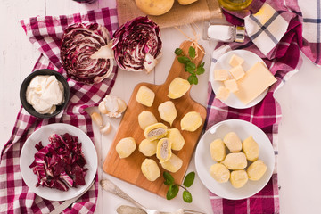 Potato gnocchi stuffed with radicchio and ricotta.	