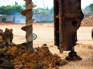 holes boring in ground with drilling rig machine