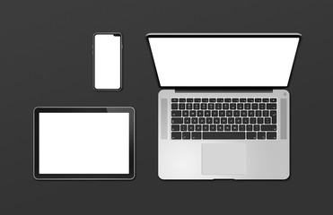 Laptop, tablet and phone set mockup isolated on black. 3D render