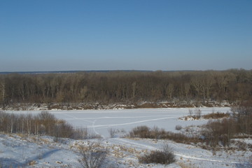 Winter landscape in forest and fields