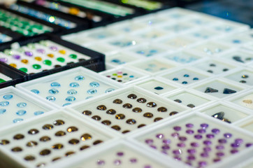 Different  faceted gemstone for sale in the jewelry store.